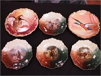Four vintage game plates including pheasant,