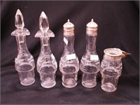 Five matching castor bottles with etched fern