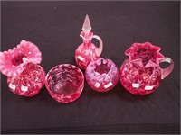 Five pieces of cranberry opalescent Fenton