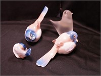 Four bird figurines: three are B&G