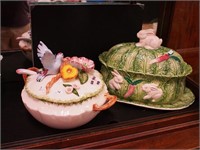 Two soup tureens with matching ladles,