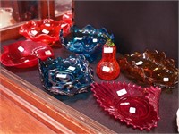 Seven pieces of colored glass: one red crackle