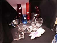 13 items, mostly glass: four bud vases,