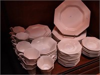 65 pieces of white china dinnerware by Nikko,