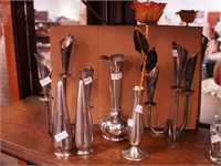 Seven metal items: salt and pepper shakers,