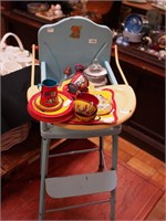 Children's tin toys: a highchair by Amsco; plus