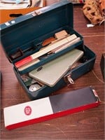 Box of engineering-related items including large