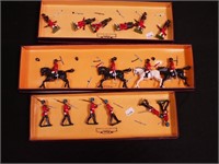 Three sets of Britains toy soldiers in original