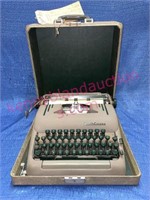 Smith-Corona typewriter in carrying case