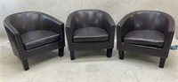Three Modern Barrel Back Chairs