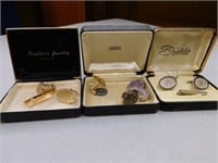 Three boxes with 4 sets of cufflink sets