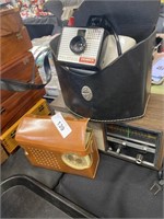 Vintage Polaroid camera, Toshiba radio.
