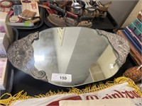 Mirror dresser plate.