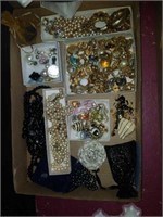 Flat of earrings, necklaces, another misc jewelry