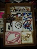Flat of pins/brooches, necklaces and earrings
