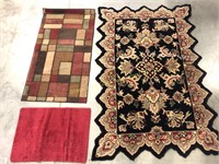 Group of three small rugs
