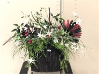 Floral arrangement in wicker basket