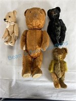 Group of four vintage jointed teddy bears
