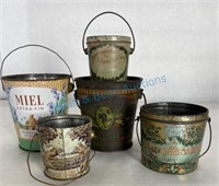 Group of antique tin pails