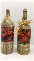 Two Lee Loftiss Decorated Bottles
