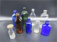 9 Glass Bottles / Bouteilles en verre