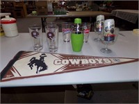 Wyoming Cowboy banner and collector beer glasses