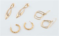 3 Pairs of gold earrings.