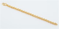 24k gold link bracelet.