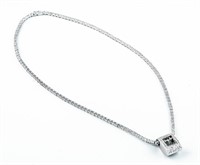 White gold diamond tennis necklace with pendant.