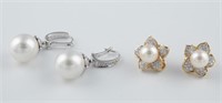 2 Pairs of 14k gold pearl earrings.