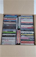 60 CD's musicaux dont Green Day