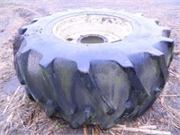 30.5x32 tire and rim, approx 50%, stubble wear