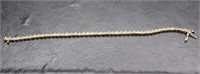 14K y gold & diamond tennis bracelet, 7 inches