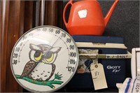 Outdoor lot, owl thermometer, water can and more