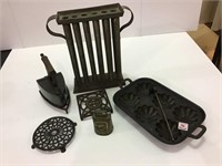 Group of Primitives Including Candle Mold,