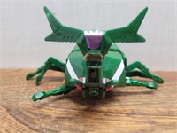 Green Bug Transformer 5 1/2inWx4inLx2 3/4inH