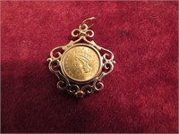 1874 $1.00 gold coin w/14k bezel around it