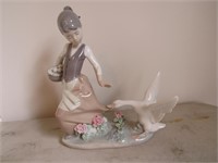 lladro lady/duck figurine