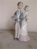 lladro man/woman figurine