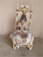 lladro lady in chair figurine