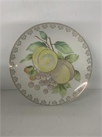 DECORATIVE PLATE ABOUT 10 INCHES ACROSS