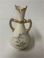 FLORAL URN ABOUT 10 INCHES TALL