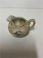 DECORATIVE CREAMER ABOUT 3 INCHES TALL