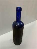 BLUE GLASS BOTTLE ABOUT 12 INCHES TALL