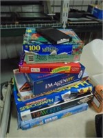 STACK OF GAMES AND PUZZLES