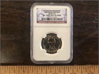GRADED FIRST DAY ISSUE LINCOLN DOLLAR