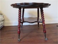 An Edwardian Claw Foot Lamp Table