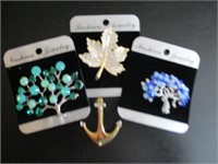 4 brooches
