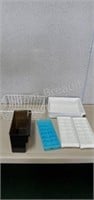 Assorted ice cube trays and baskets