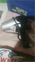 Sunbeam gray and black blow dryer with storage bag